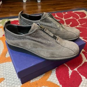 The brand is Stuart Weitzman
Sneaker